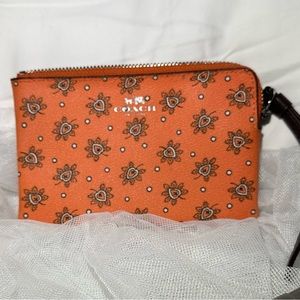 Small zip around coach wristlet